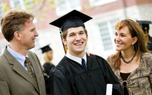 graduating senior with his parents